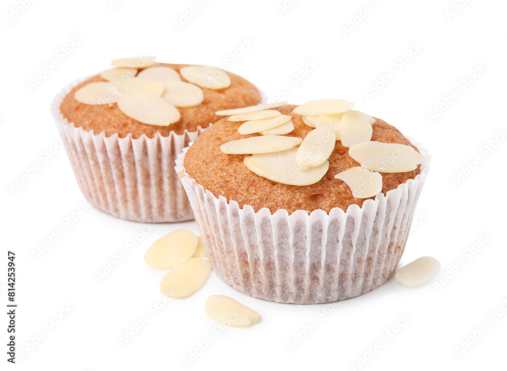Muffins with fresh almond flakes isolated on white Muffins with fresh almond flakes isolated on white