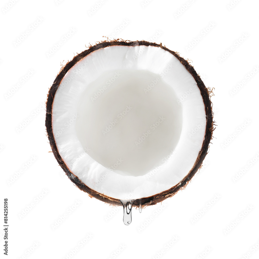 Coconut with dripping oil isolated on white