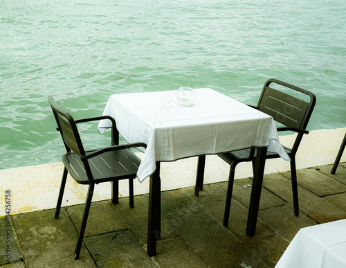 table and chairs on the beach