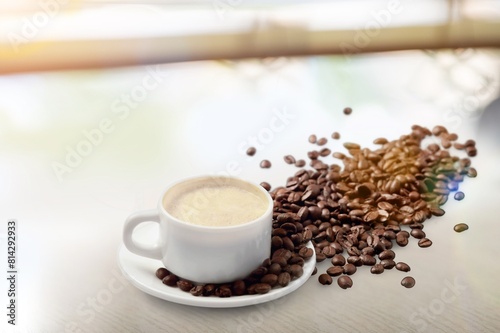 black coffee in cup  with aroma beans