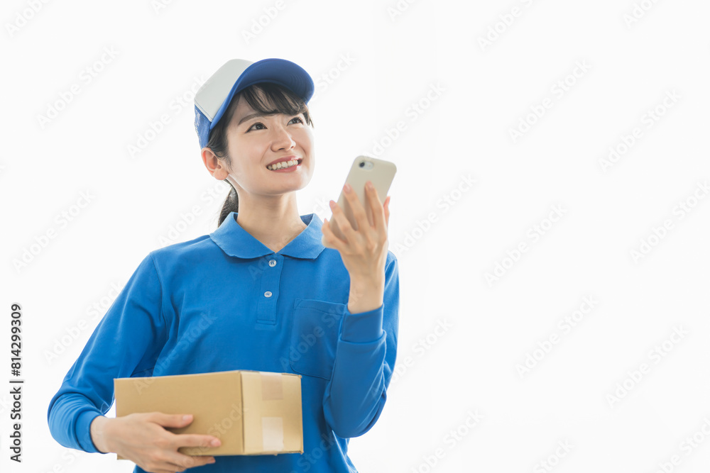 スマホを使う配達員の女性(配達・軽貨物ドライバー・宅配・配達員・宅急便)
スマホを使う配達員の女性(配達・軽貨物ドライバー・宅配・配達員・宅急便)