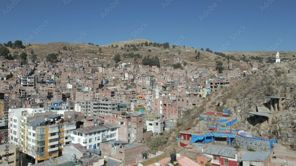 A beautiful aerial presentation of Puno, a city in Perù A beautiful aerial presentation of Puno, a city in Perù