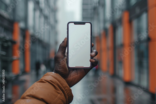 Hand Holding Smartphone  Mockup Template
