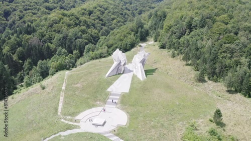 The big white monument Tjentiste spomenik in Sotizka National Park photo