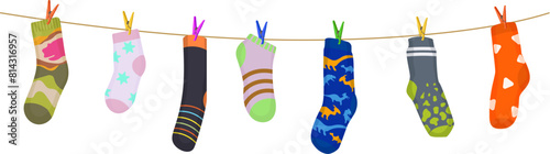 Clothesline with cotton and wool socks, rope with clothepins. Colorful socks on clothesline isolated vector, wool laundry hanging and drying, cartoon wet clothing on a rope with clothepins photo