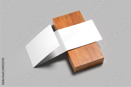 Blank landscape trifold with a silver sand background on the wood