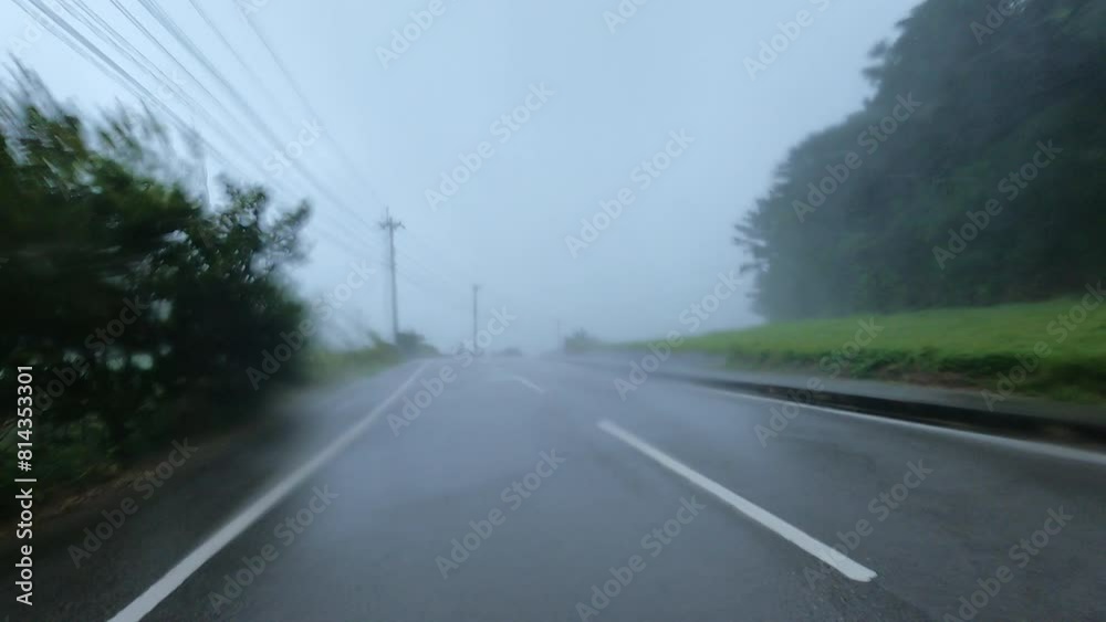 Driving In Ferocious Wind And Rain Of Typhoon Infa On Rural Highway Driving In Ferocious Wind And Rain Of Typhoon Infa On Rural Highway