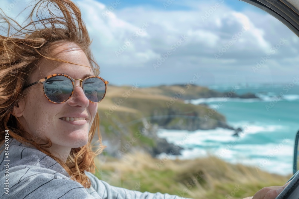 A woman enjoying a solo drive along a scenic coastal route, wind blowing through her hair A woman enjoying a solo drive along a scenic coastal route, wind blowing through her hair