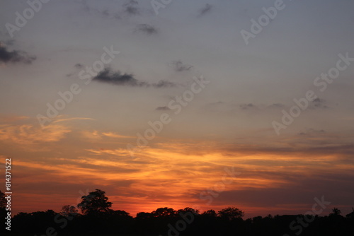 Sunset Sky Clouds in the evening with Red  Orange  Yellow and purple sunlight on Golden hour after sundown  Romantic sky in summer on Dusk Twilight