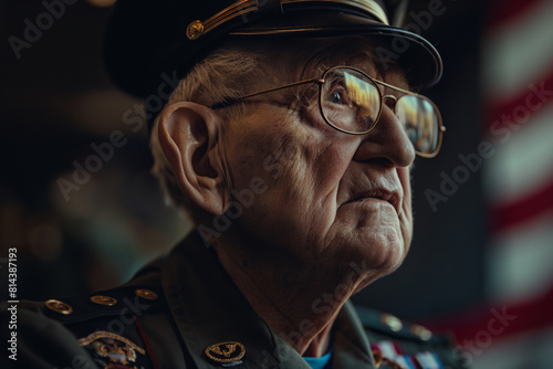 Close-up portrait of a senior soldier in uniform and glasses.