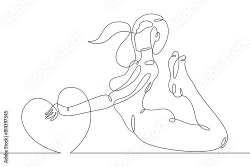 One continuous line.Beautiful woman holding a heart in her hands.Valentine's Day. Girl with a heart symbol of love. Continuous line drawing.Lineart isolated white background.