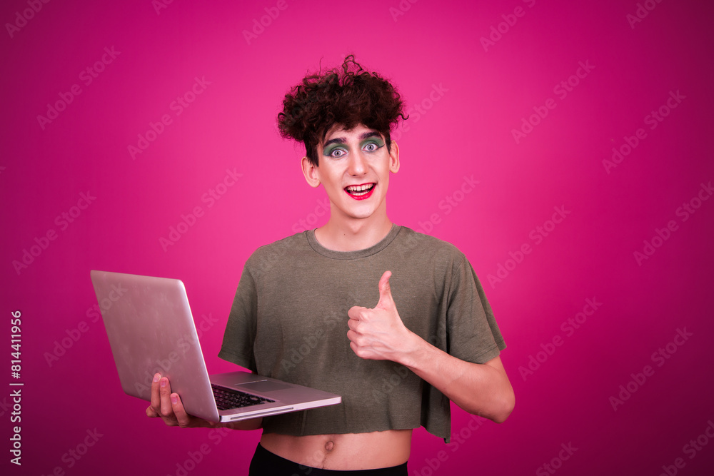 Funny guy dressed as a drag queen and online dating. Pink background. Funny guy dressed as a drag queen and online dating. Pink background.