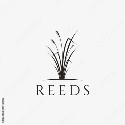 Vintage elegant grass, cattail, reeds logo vector icon with hanging praying mantis concept on white background
