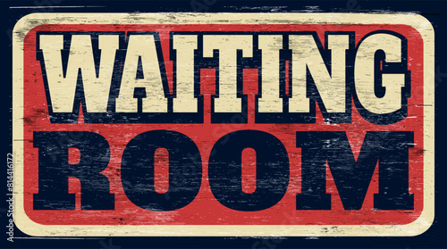 Aged and worn waiting room sign on wood