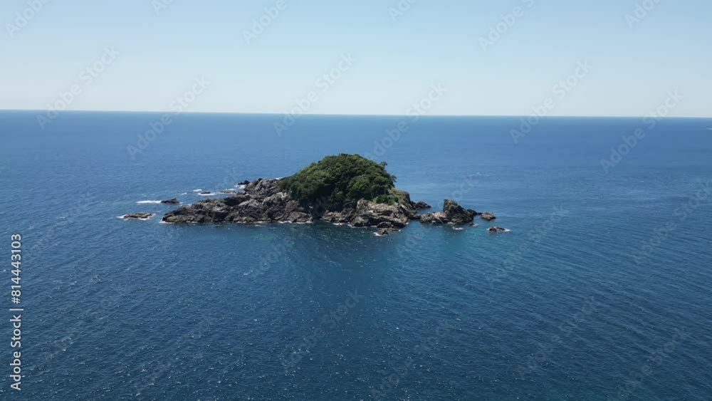 Aerial video of rock formations that make Karekinada beach a photogenic spot on the beach. Japan