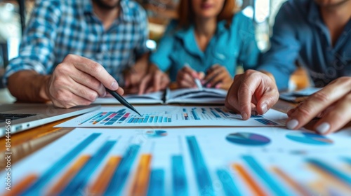 Business leaders engage in a strategic planning session, discussing long-term objectives and conducting a PESTLE analysis to assess external factors impacting their industry. Their forward-thinking