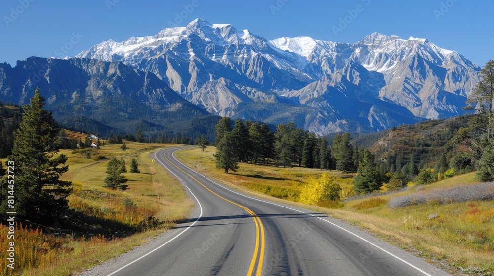 Fototapeta premium Serene Mountainous Scenery with Winding Road