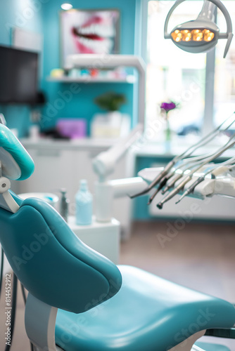 Blue dentist chair in a professional dentist office. Dental clinic creative background, dentist office website graphic. Teeth hygiene, dental equipment and dentistry banner.
