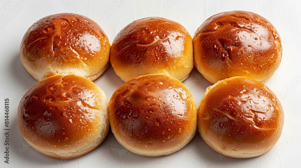 Advertising-ready top view of Brioche buns, with a focus on their fluffy interior and golden exterior, ideal for gourmet burgers, isolated background