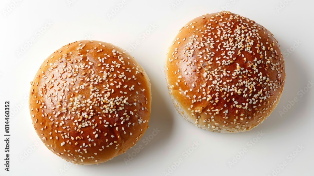 Advertising-ready top shot of classic sesame seed buns with a golden, elegant exterior and soft texture, studio lighting, isolated background Advertising-ready top shot of classic sesame seed buns with a golden, elegant exterior and soft texture, studio lighting, isolated background