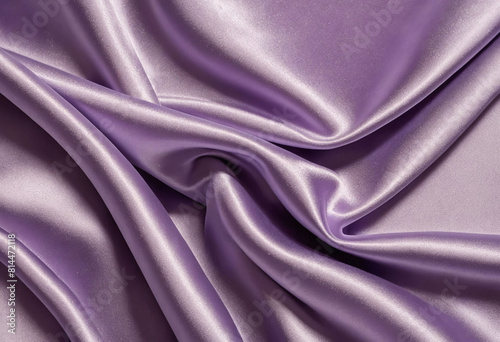 The texture of the lavander satin fabric is smooth and shiny