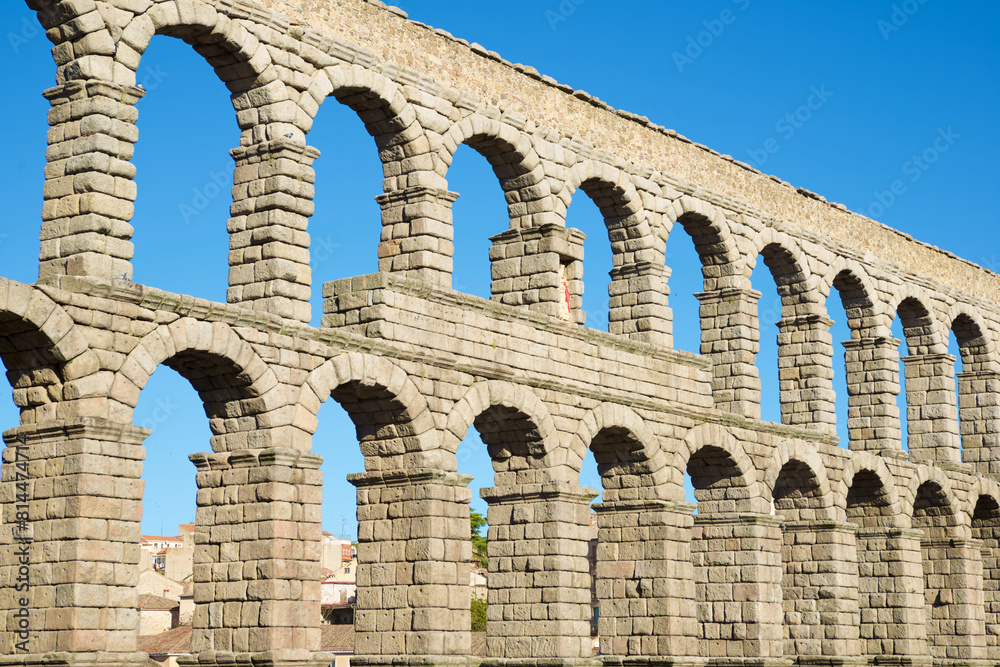 View of the Roman aqueduct in the city of Segovia, Castilla Leon in Spain. View of the Roman aqueduct in the city of Segovia, Castilla Leon in Spain.