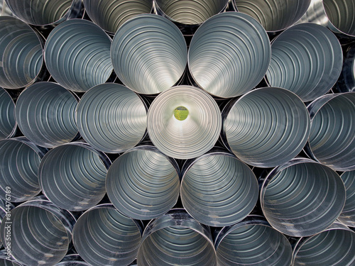 stainless steel, clay flexible chimney insert. Single shell gas liner. It ensures a clear passage of smoke and flue gases. a pile of bran nested on top of each other in a circular pattern shiny sheet 