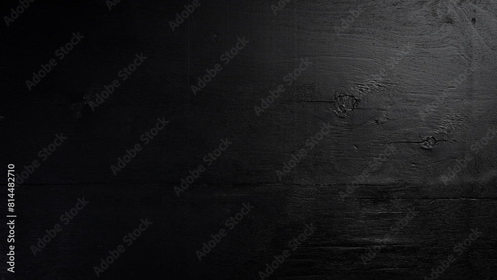 Black textured wooden background. Free space for design or text. Top views Black textured wooden background. Free space for design or text. Top views