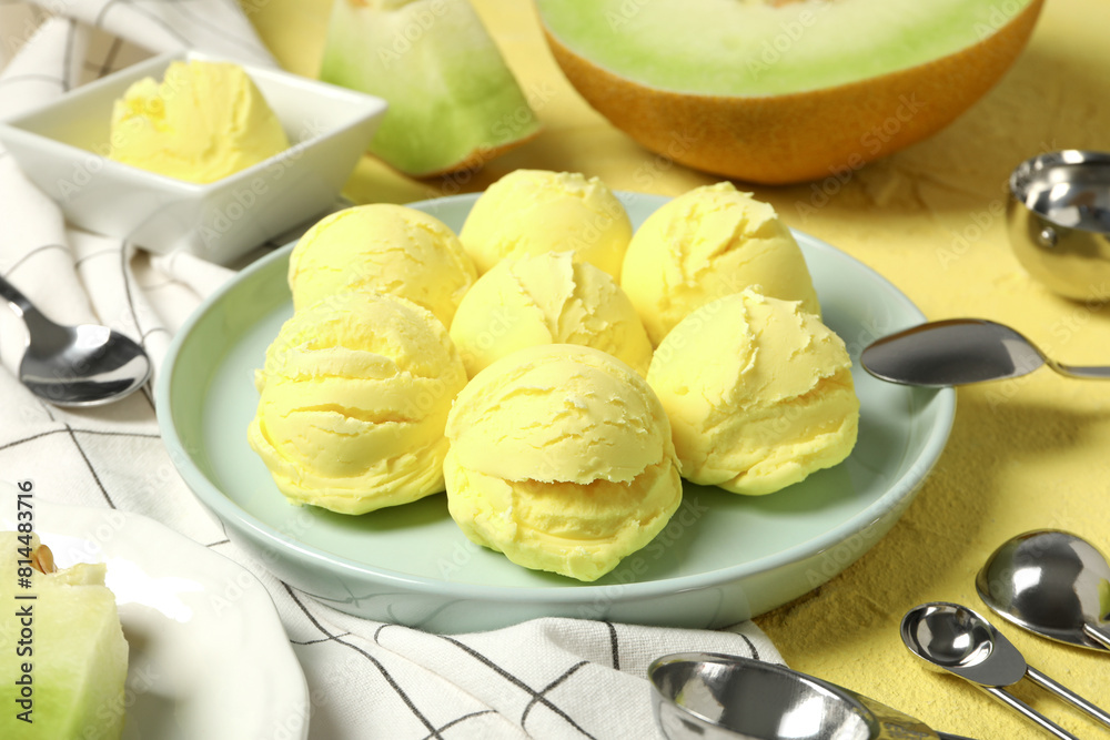 Ice cream scoops in a bowl with slices of fresh melon Ice cream scoops in a bowl with slices of fresh melon