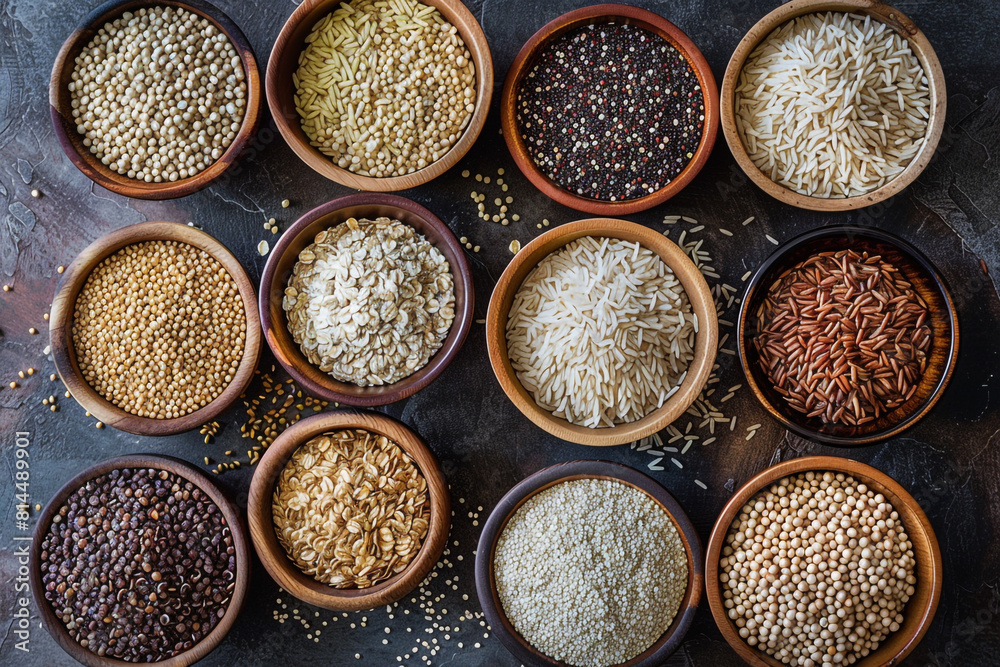 A variety of whole grains including brown rice, quinoa, oats, and barley arranged in bowls, symbolizing a nutritious diet for a healthy lifestyle A variety of whole grains including brown rice, quinoa, oats, and barley arranged in bowls, symbolizing a nutritious diet for a healthy lifestyle