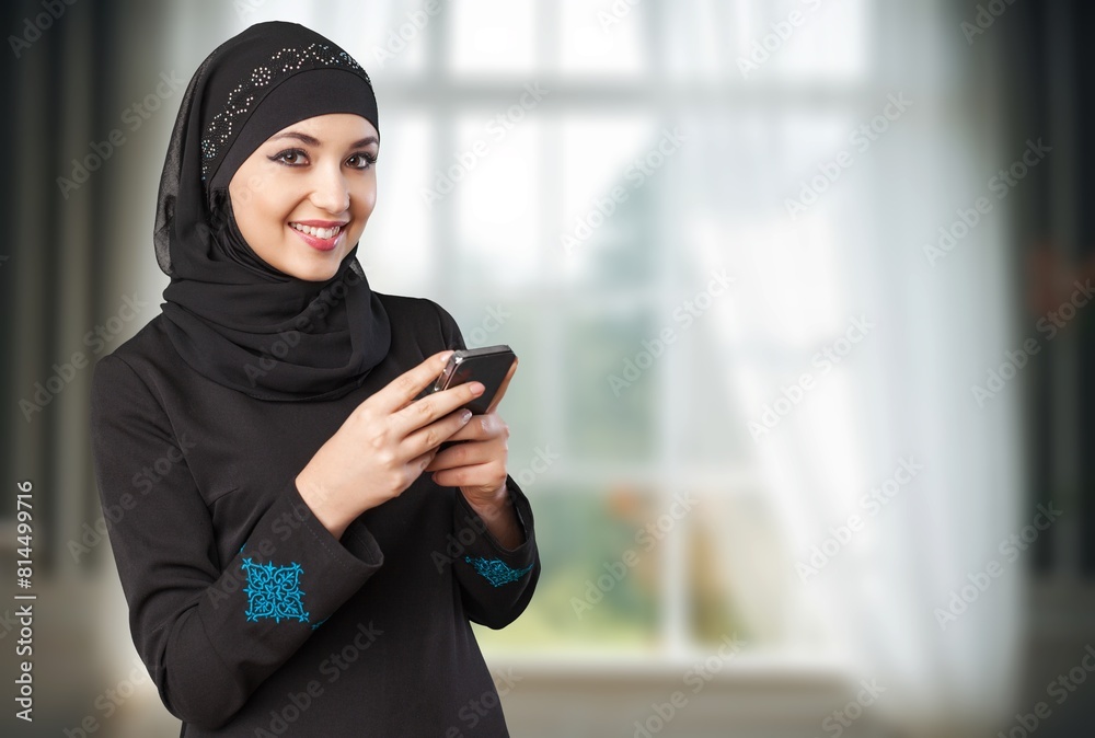 Beautiful smiling arab woman at modern home Beautiful smiling arab woman at modern home