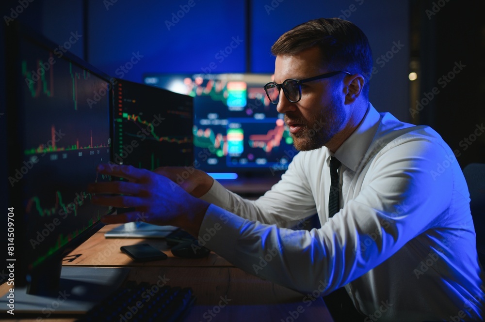 Financial Analysts and Day Traders Working on a Computers with Multi-Monitor Financial Analysts and Day Traders Working on a Computers with Multi-Monitor