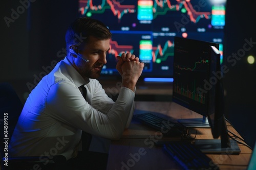 Financial Analysts and Day Traders Working on a Computers with Multi-Monitor