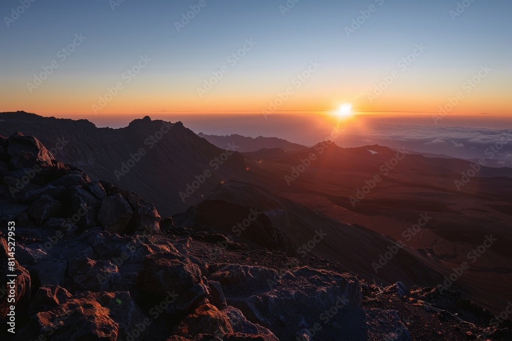 Sunrise Cresting Over Misty Mountain Ridges