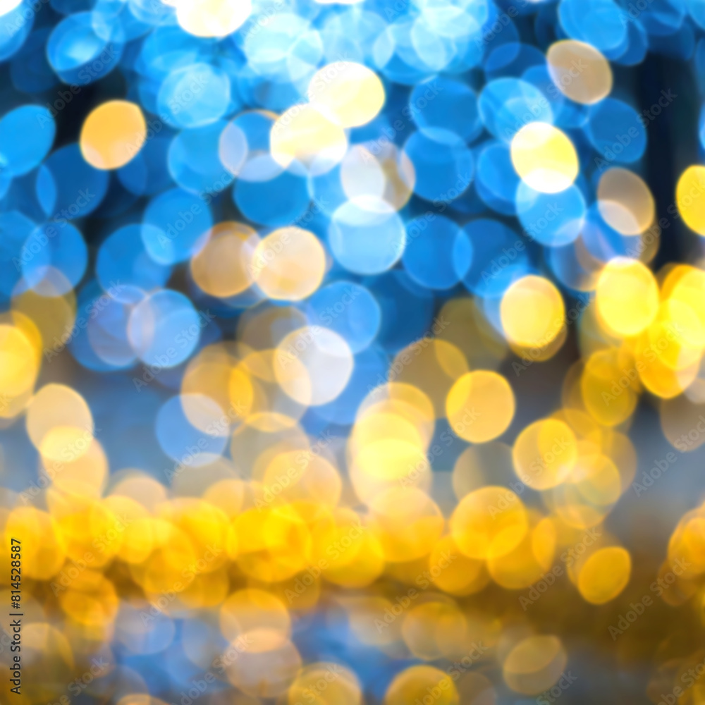 The image is a blurry, colorful background with yellow and blue circles The image is a blurry, colorful background with yellow and blue circles
