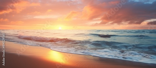 Beautiful sunset at the beach with a picturesque view of the sea sand and a play of sunlight and shadows Ideal for a copy space image