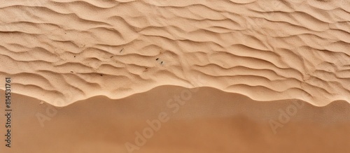 Top view of a sandy beach f...