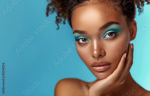 Woman With Blue Makeup and Bright Blue Eyes