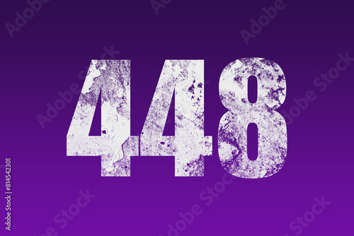 flat white grunge number of 448 on purple background. photo