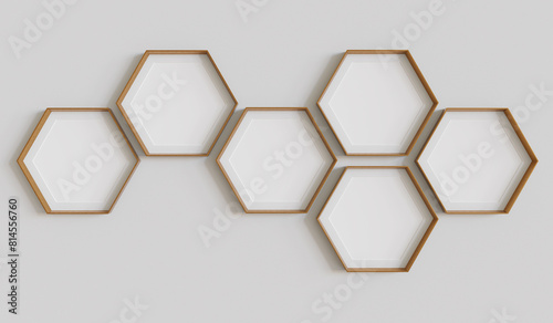 Copper hexagon blank photo frames mockup hanging on interior wall. Hexagonal pictures on painted surface. 3D rendering