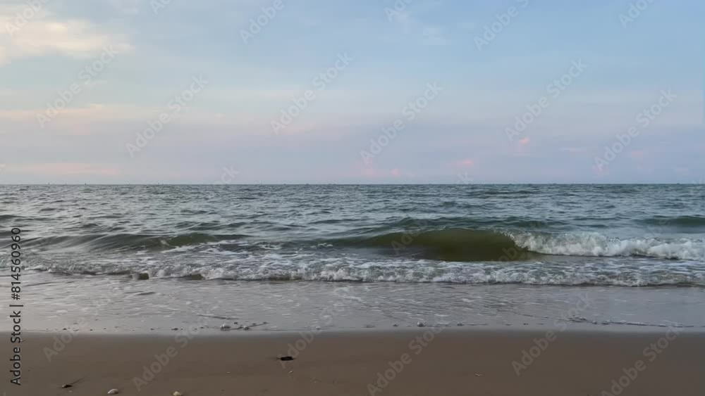 Beautiful view with a row of small fishing boats in the distance in the afternoon with a blue sky in the background in Central Java, Indonesia Beautiful view with a row of small fishing boats in the distance in the afternoon with a blue sky in the background in Central Java, Indonesia