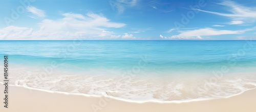 A picturesque scene of a sunny day with white sand a clear blue sea and plenty of space for text or images. with copy space image. Place for adding text or design