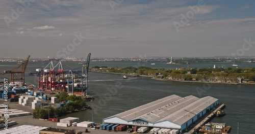 NYC New York Aerial v207 low drone flyover Waterfront district in Brooklyn capturing shoreside shipyard, channel and views of Governors Island and Red Hook - Shot with Inspire 3 8k - September 2023 photo