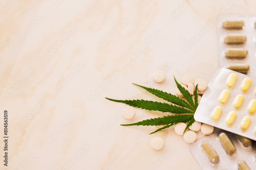 Mockups of medicines on a beige background with cannabis leaf. Mockups of medicines on a beige background with cannabis leaf.