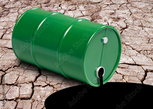 Oil spill on cracked earth, composite image