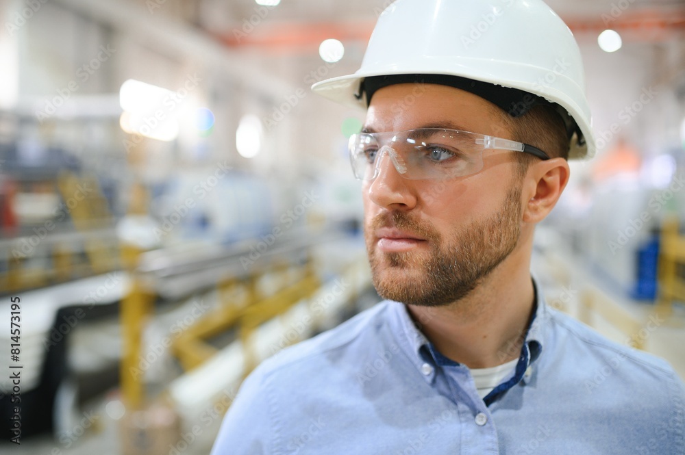 Portrait of confident handsome technical engineer in hardhat. Portrait of confident handsome technical engineer in hardhat.