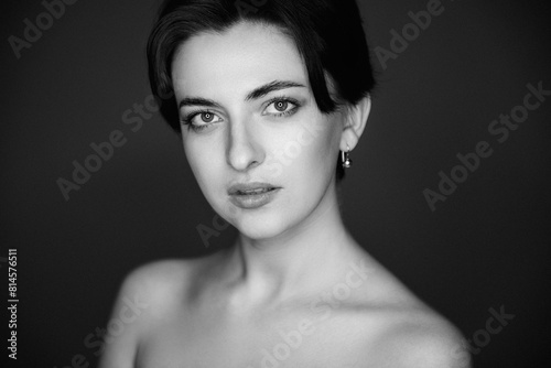 Studio portrait of a beautiful girl. Grain effect used