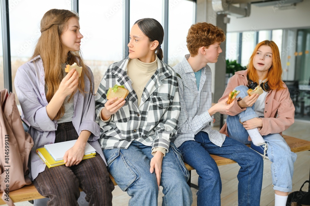 Pupils having lunch in classroom