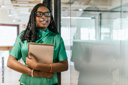 Confident professional woman in modern coworking space