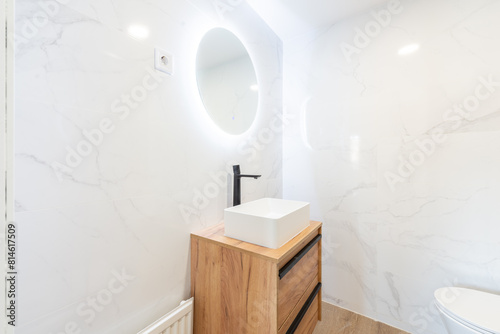 Elegant bathroom in modern empty apartment photo